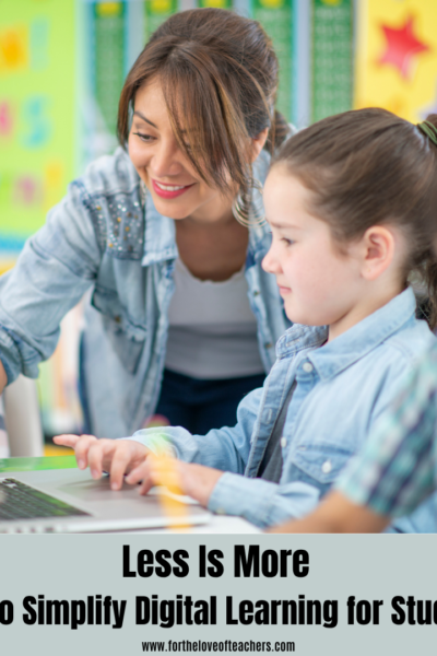 Teacher helping students with digital learning in the classroom.